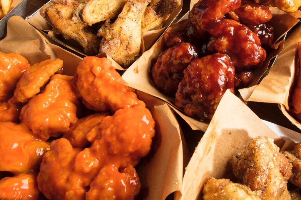Multiple flavors of 30-piece boneless wings from Charleys Cheesesteaks